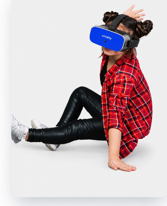 A student wearing a Umety VR headset, fully immersed in an interactive 3D experience
