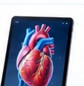 Tablet displaying a 3D model of the human heart